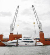 Lift your pleasure craft out of the water on to a ship, Worldwide  yacht deliveries.